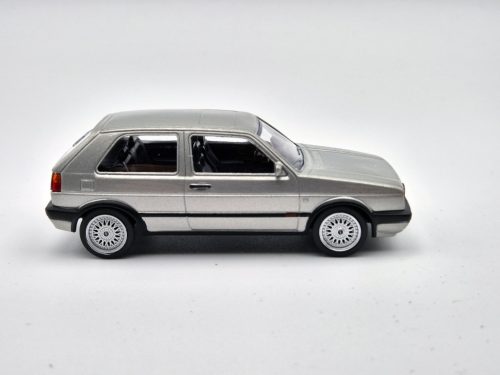Volkswagen VW Golf GTI G60 (1990) - strieborná- Norev 1:43