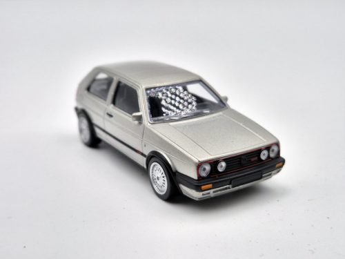 Volkswagen VW Golf GTI G60 (1990) - strieborná- Norev 1:43