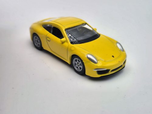Porsche Carrera 4S 911 - žltá -  Welly - 1:64
