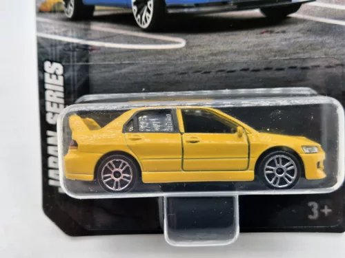 Mitsubishi Lancer Evolution EVO - žltá -  Majorette - 1:64