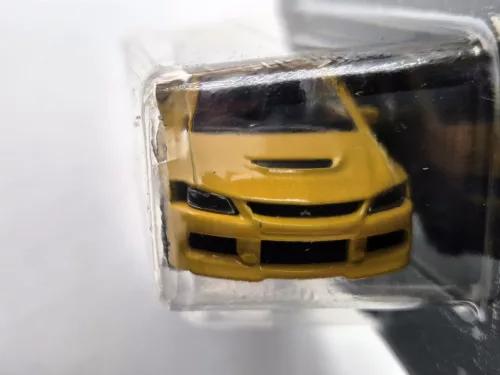 Mitsubishi Lancer Evolution EVO - žltá -  Majorette - 1:64