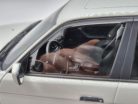 BMW E34 Touring (1996) - biela -  Triple9 - 1:18
