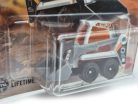 Skidster - bobcat nakladač - 121/125 - v blistri - Matchbox - 1:64
