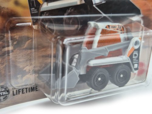 Skidster - bobcat nakladač - 121/125 - v blistri - Matchbox - 1:64